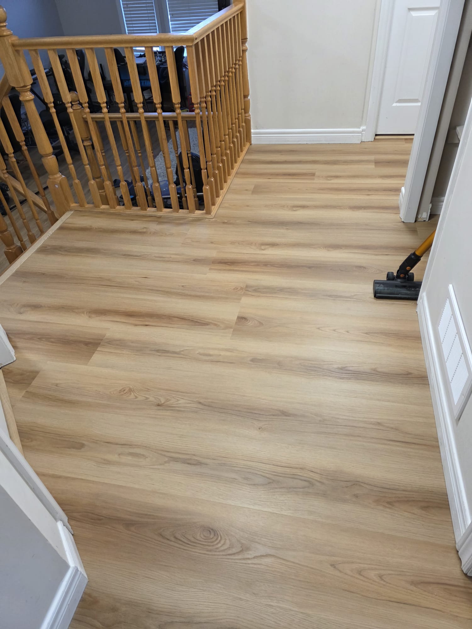 Final result of the flooring project with a clean, professional aesthetic.