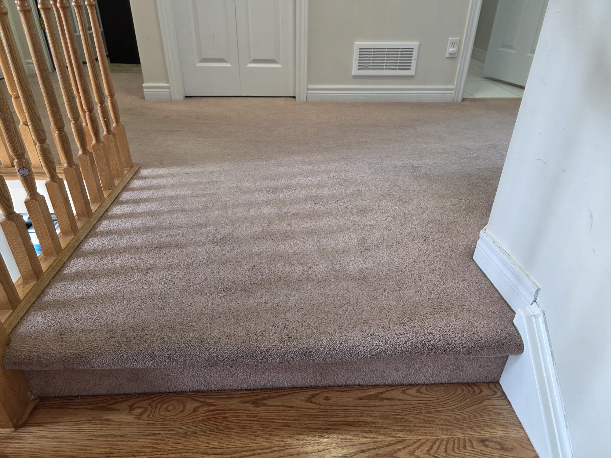 Room snapshot showing original floor before starting the vinyl plank project.