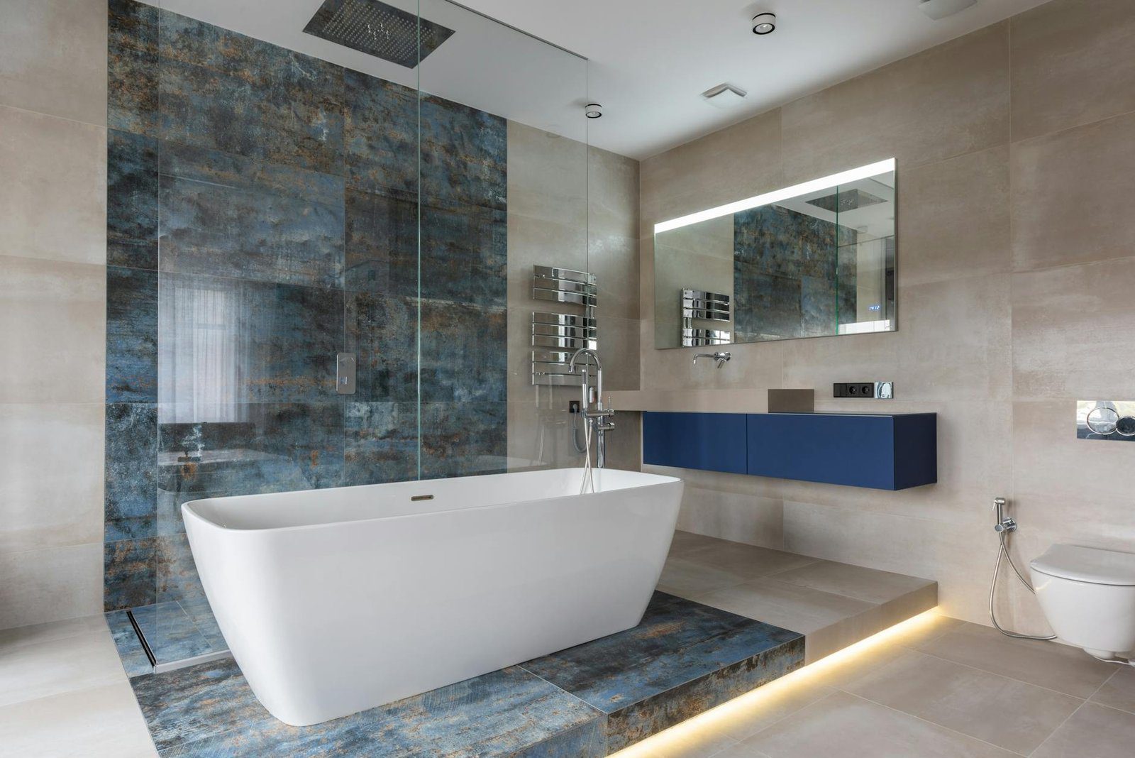 Elegant finished bathroom renovation in Waterloo with a sleek freestanding bathtub.